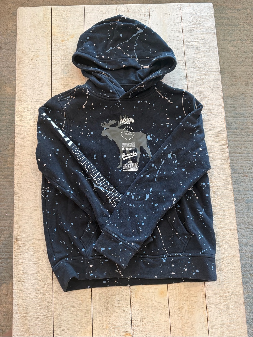 abercrombie kids navy hoodie with white splatter